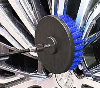 Drill brush scrubbing between wheel spokes